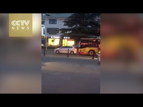 bus driver intentionally hits car and runs over
