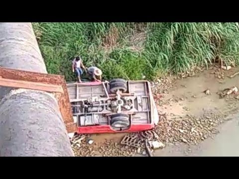two dead after school bus falls off bridge