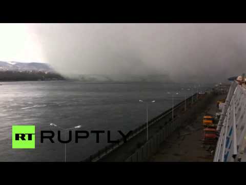 freak snow storm swallows bridge in siberia