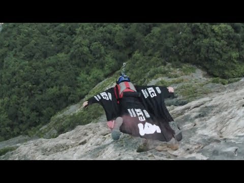 chinese wingsuit pilot becomes the first in the world