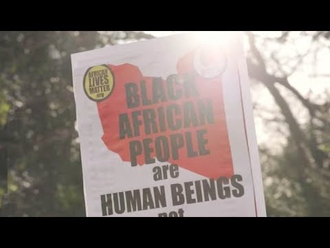 demonstrators protest against slavery