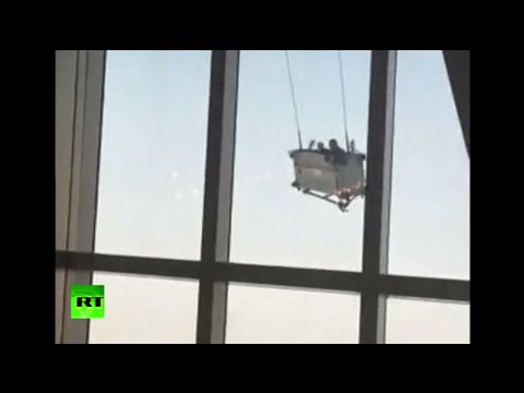 window cleaning cradle goes mad 91 floors up